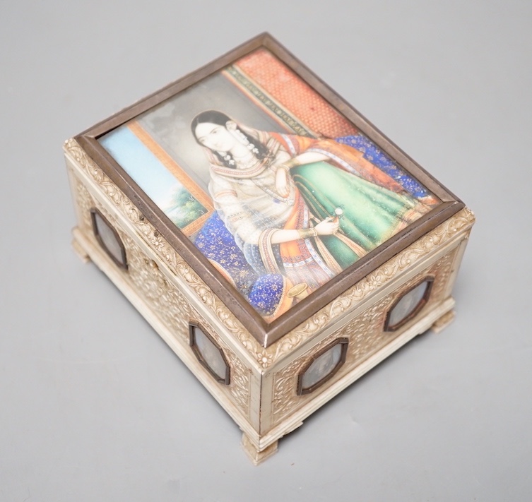 A Company School ivory box, India, 19th century 7.5cm high, 12cm long, 9.5cm wide, inset with miniatures of royalty